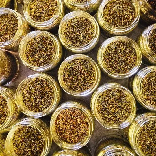 Jars of dried Greek oregano in the kitchen